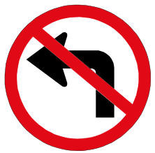Left turn ahead prohibited sign